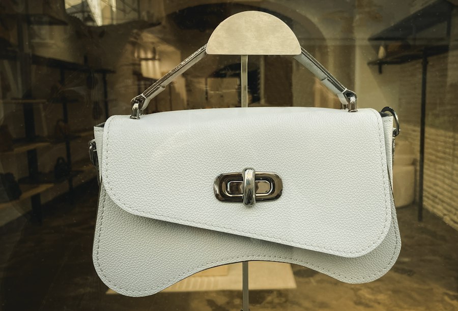 Ivory handbag with a silver-toned clasp
