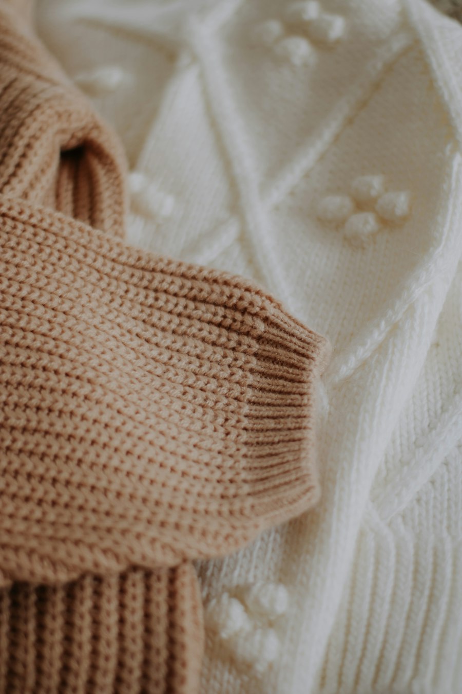 Close-up of soft neutral knit fabrics